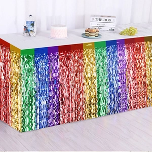 Close-up of rainbow laser foil fringe table skirt with metallic iridescent texture