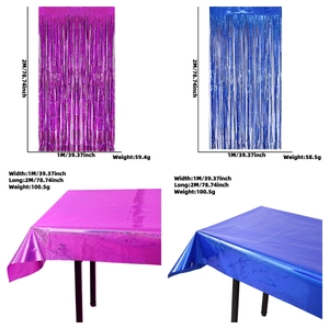 Gender reveal party decorations set with pink and blue laser foil curtains and tablecloth