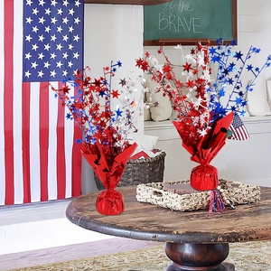 Two Independence Day tabletop fountain decorations with red, blue, and silver metallic stars