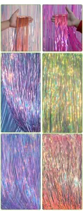 Detail showing various colors of laser tinsel curtains for festive party backdrop decor