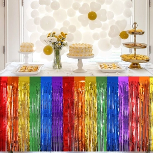 Rainbow foil fringe table skirt for colorful party decorations and festive backdrop
