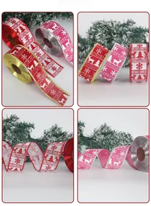 Detail of Christmas ribbons with reindeer and snowflake prints in red and silver