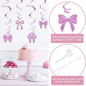 Decorazioni a spirale con fiocchi glitterati rosa e ciondoli in feltro per compleanni