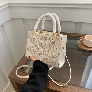Straw woven square handbag with floral embroidery and gold hardware for women