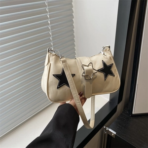 Chic beige PU leather square handbag featuring stylish black star patches and metal star buckle