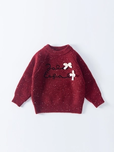 Girls dark red knitted sweater with snowflake pattern and bows for New Year outfit