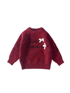 Girls' deep red knit sweater with white speckled texture, embroidery, and bows