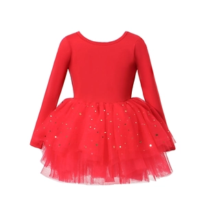 Detail of red tutu skirt with golden star sequins and tiered mesh for ballet