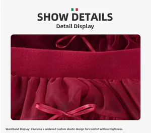 Detail of burgundy tutu skirt featuring widened elastic waistband and silk ribbon bow