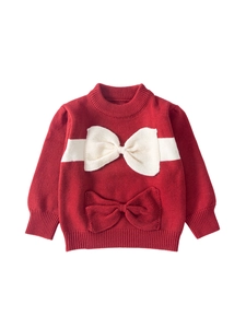 Girls red knit sweater featuring oversized 3D bows with ribbed cuffs and hemline