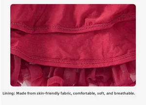 Close-up of skin-friendly lining and double-stitched mesh hem on dark red tutu skirt