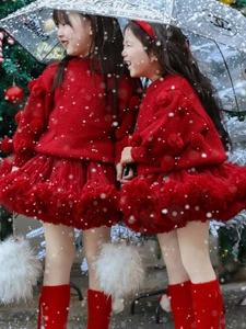 Festive red Christmas knit sweater with pom-poms and matching tutu skirt for girls