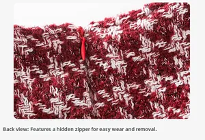 Primer plano de un vestido de tweed rojo para niña con cremallera invisible detrás