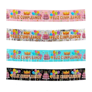 Spanish Feliz Cumpleaños birthday banners with tassels in pink, silver, blue, and black