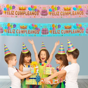 Spanish Feliz Cumpleaños banner with blue and pink fringe tassels for birthday party decoration