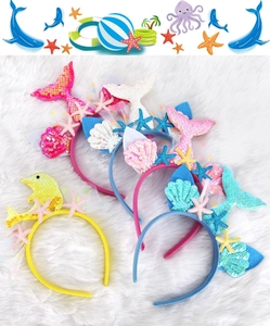 Detailed view of colorful sequin ocean headbands featuring mermaid tails and starfish