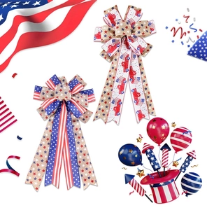 Detail view of burlap Independence Day bows with American flags and red truck patterns