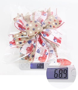 Detailed view of handmade burlap patriotic bow showing weight of approximately 68.9g