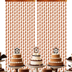 Orange cowboy boot fringe curtain for western theme party backdrop decoration