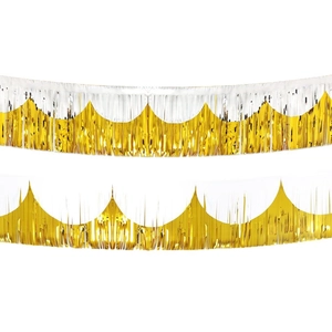 Metallic gold and silver fringe curtains with scalloped crown edges for party decor