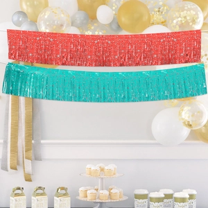 Red and teal macaron fringe banners with silver star patterns for party wall decoration