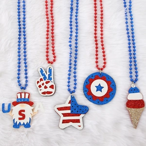 Independence Day beaded necklaces with red white blue stars and festive USA gnomes