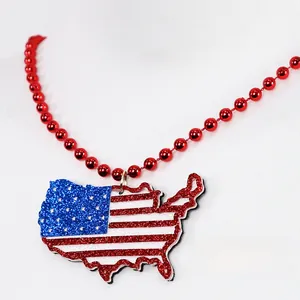 Detailed macro view of 3D USA map pendant with American flag glitter and red bead chain