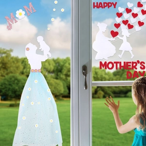 Detail of Mother's Day window stickers with Mom silhouette and pink glitter MOM letters
