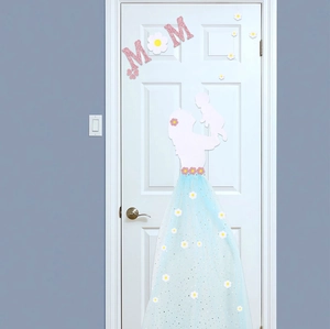 Detail of Mother's Day felt door decoration with pink glitter MOM letters and white silhouette