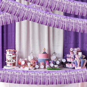 Close-up of purple metallic foil fringe curtain for party wall decoration background