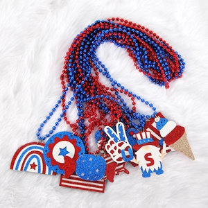 Independence Day beaded necklaces with glittery US flag pendants and patriotic charms