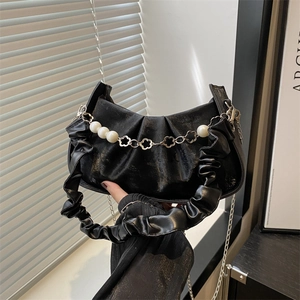 Fashionable black pleated square handbag with glossy leather and pearl flower chain