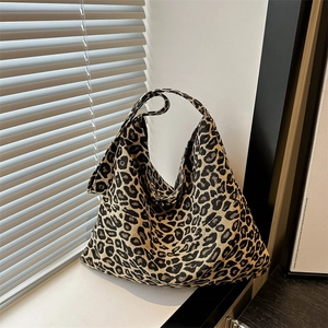 Spacious leopard print canvas tote bag for women, stylish large capacity shoulder handbag