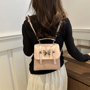 Fashionable pink butterfly backpack for women with adjustable straps and matte faux leather
