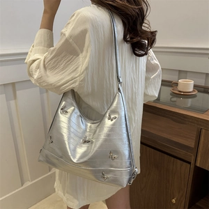 Silver metallic shoulder bag with butterfly 3D motifs and textured surface for women