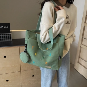 Grass green canvas tote bag with colorful embroidered letters and mini coin purse