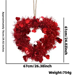 Detail view of heart-shaped sequin wreath with red tinsel and size dimensions