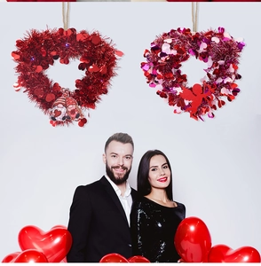 Detail of sequin heart wreaths with Cupid and gnome designs for Valentine party decor