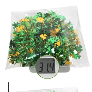 Weight measurement of a 2m green and gold shamrock tinsel garland for St. Patrick's Day