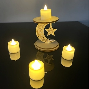 Moon and star shaped wooden candle holder set with four warm white LED tealights