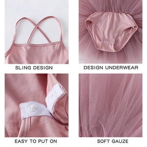 Detail view of pink ballet tutu dress featuring soft mesh gauze and resin snap buttons