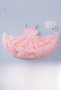 Detail showing layers of pink mesh fabric on a puffy tutu dress for girls