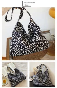 Detail of large leopard black canvas tote bag showing texture and spacious design