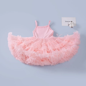 Detailed top view of pink girls tutu dress with multi-layered ruffled tulle fabric