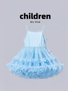 Close-up of layered sky blue tutu skirt with delicate mesh fabric and silk bow detail