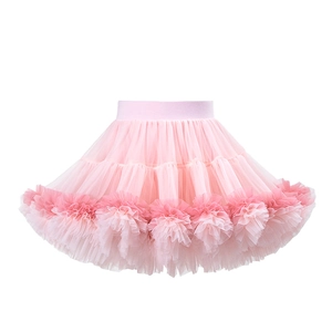 Detail of pink gradient tutu skirt showing multi-layer mesh tulle and elastic waistband
