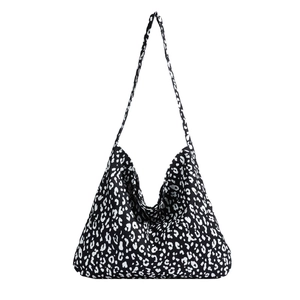 Minimalist animal print hobo crossbody bag with large capacity in black and white