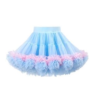 Detail of multi-layer blue and pink mesh tutu skirt with elastic waistband and ruffles