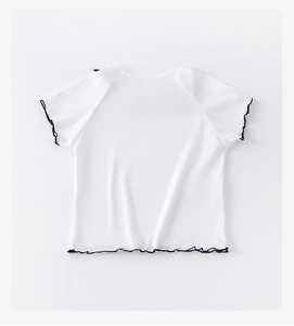 Close-up of girls white ribbed ice silk T-shirt with black lettuce edge hem and sleeves