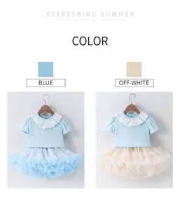 Détail de t-shirt en dentelle pour filles avec jupe tutu en tulle bleu et blanc cassé